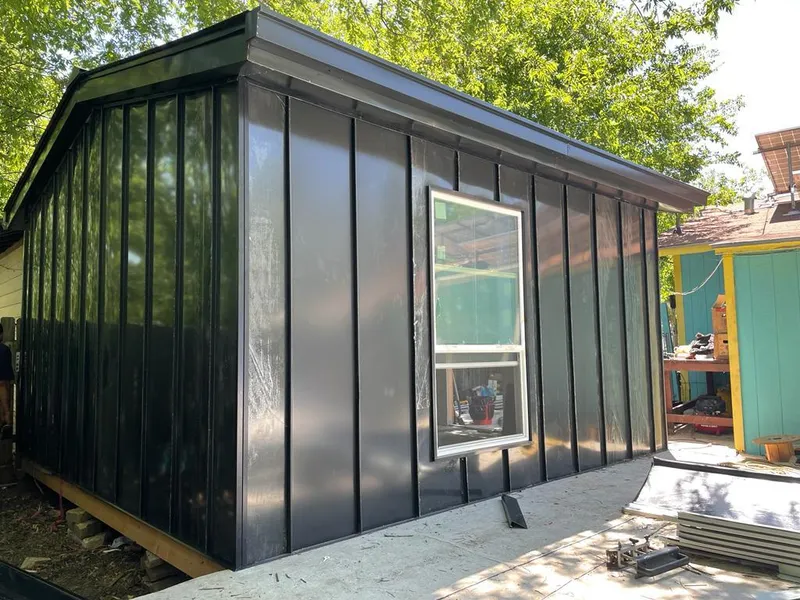 Black standing seam metal wall panels for Roof Inspection in Gibsonville